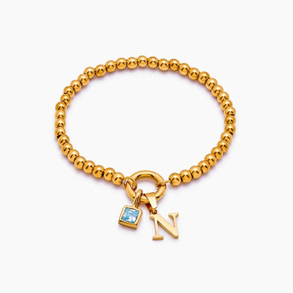 beaded-initial-birthstone-bracelet — Gold / Dec-Blue Topaz