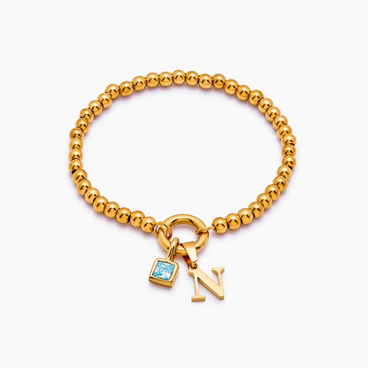 beaded-initial-birthstone-bracelet — Gold / Mar-Aquamarine