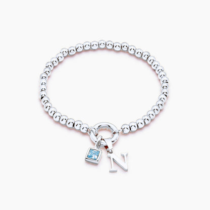 beaded-initial-birthstone-bracelet — Silver / Dec-Blue Topaz